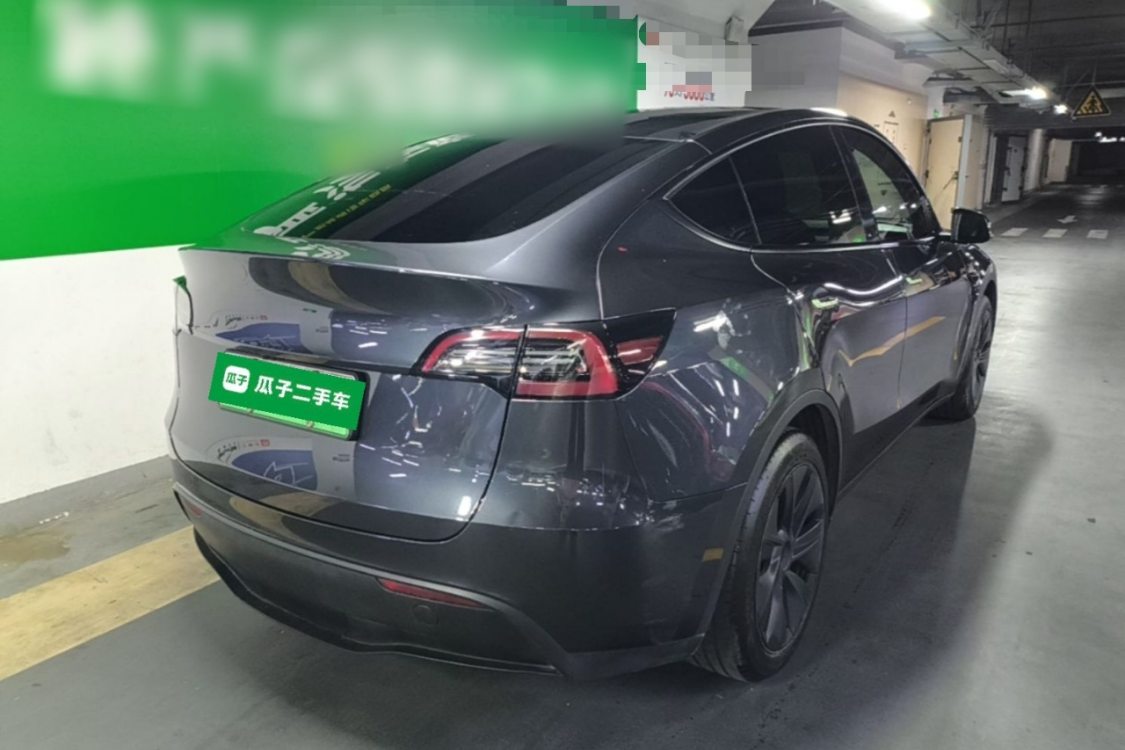 Tesla Model Y 2024 #4 Tesla Model Y 2024 car image #4
