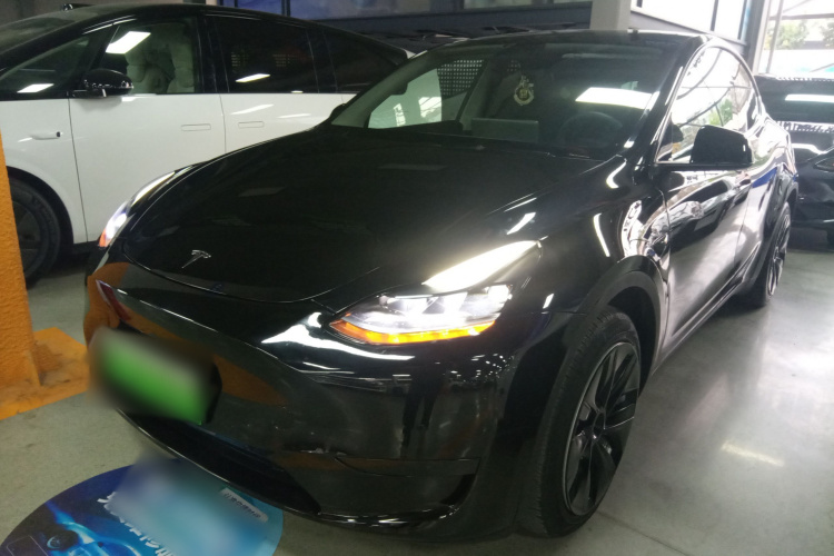 Tesla Model Y 2023 #2 Tesla Model Y 2023 car image #2