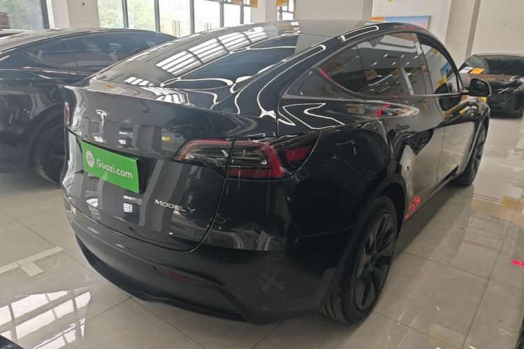 Tesla Model Y 2024 #7 Tesla Model Y 2024 car image #7