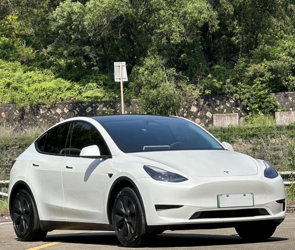 Tesla Model Y 2024 #3 Tesla Model Y 2024 car image #3
