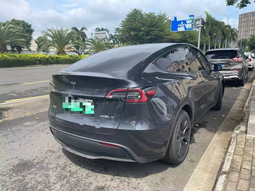 Tesla Model Y 2024 #4 Tesla Model Y 2024 صورة سيارة #4