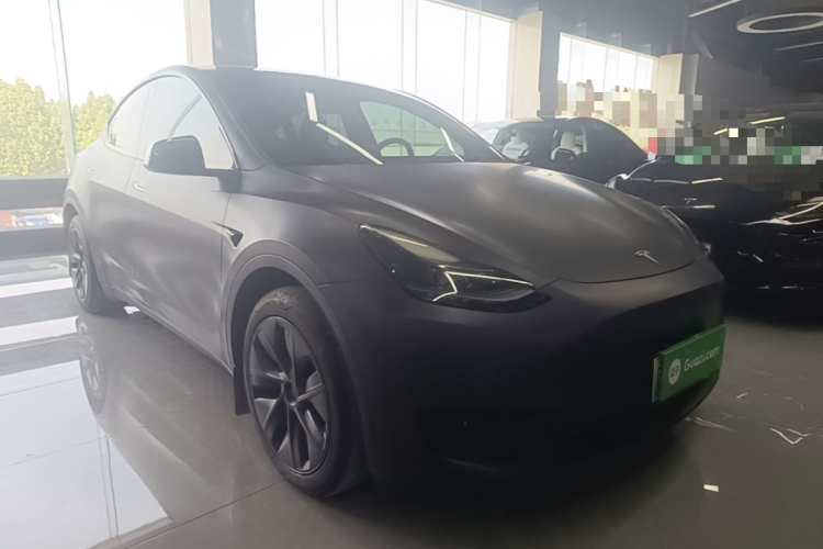 Tesla Model Y 2024 #4 Tesla Model Y 2024 car image #4