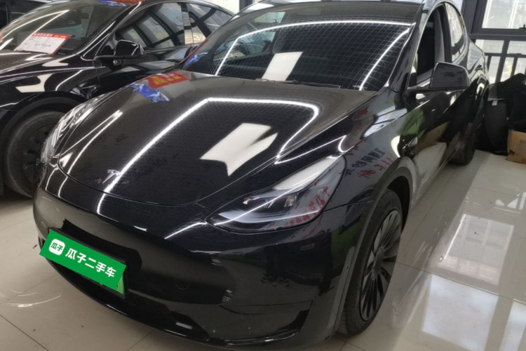 Tesla Model Y 2024 #2 Tesla Model Y 2024 car image #2
