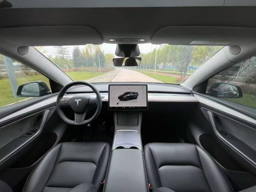 Tesla Model Y 2024 #6 Tesla Model Y 2024 car image #6