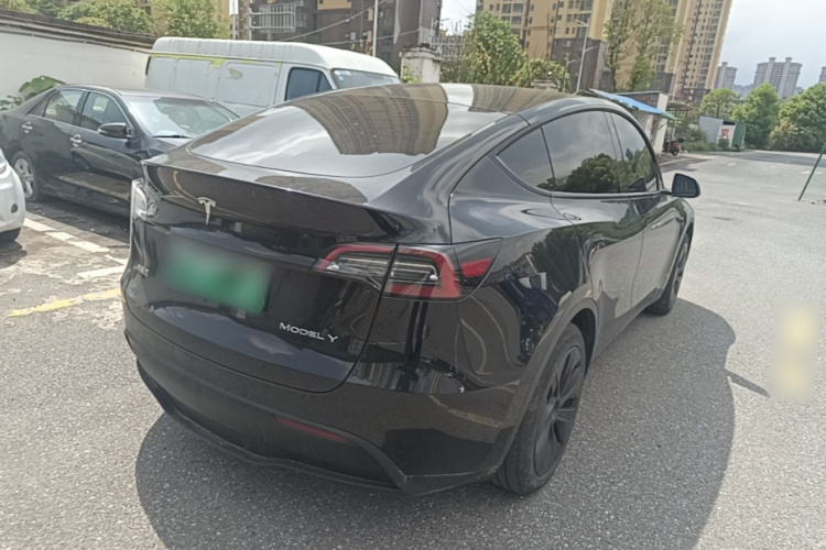Tesla Model Y 2024 #7 Tesla Model Y 2024 car image #7