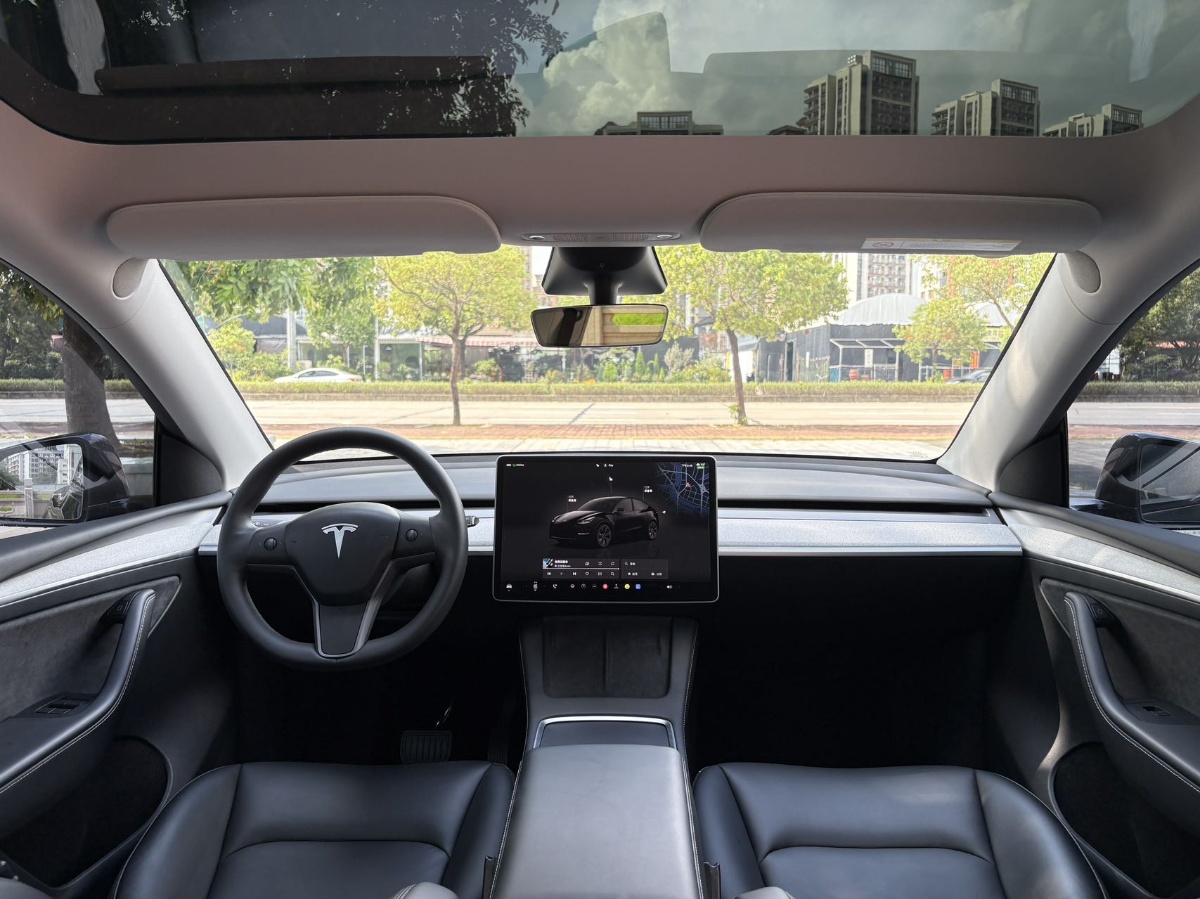 Tesla Model Y 2024 #5 Tesla Model Y 2024 car image #5