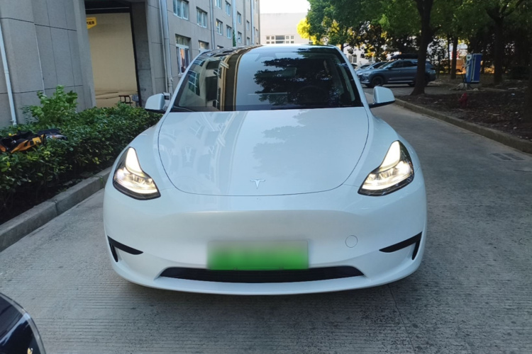 Tesla Model Y 2024 #3 Tesla Model Y 2024 car image #3