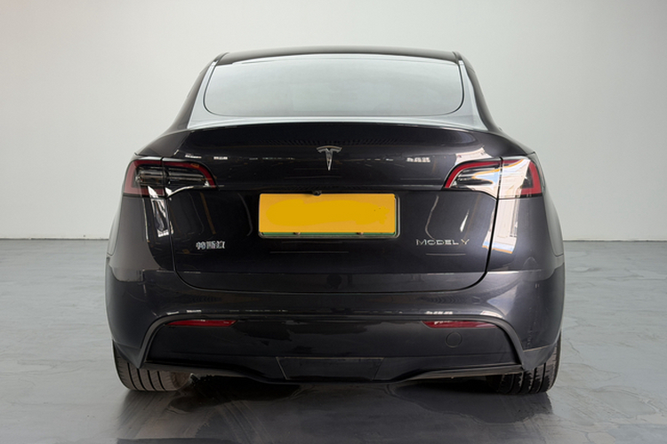 Tesla Model Y 2024 #4 Tesla Model Y 2024 car image #4