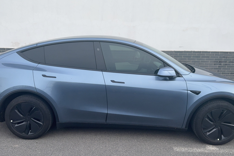 Tesla Model Y 2026 #5 Tesla Model Y 2026 car image #5
