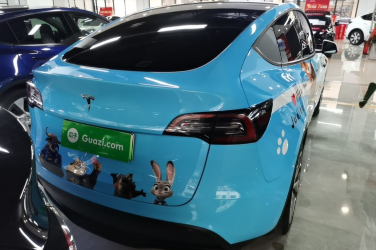 Tesla Model Y 2023 #4 Tesla Model Y 2023 изображение автомобиля #4