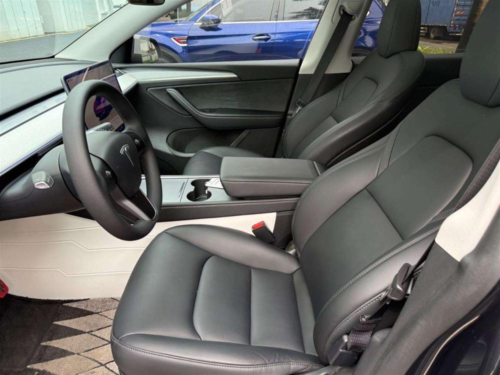 Tesla Model Y 2024 #10 Tesla Model Y 2024 car image #10