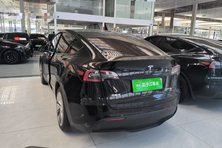 Tesla Model Y 2023 #5 Tesla Model Y 2023 car image #5