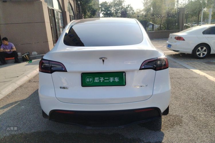 Tesla Model Y 2024 #6 Tesla Model Y 2024 car image #6