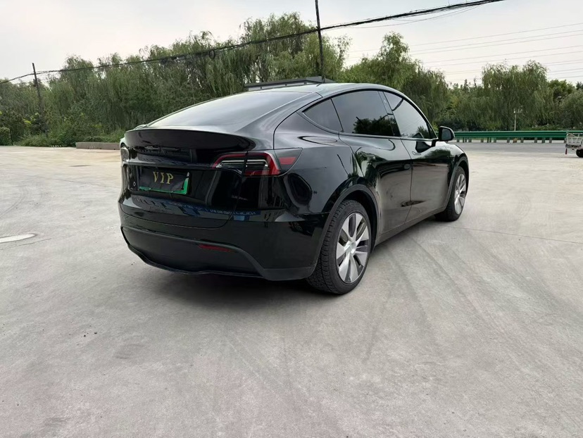 Tesla Model Y 2023 #4 Tesla Model Y 2023 car image #4