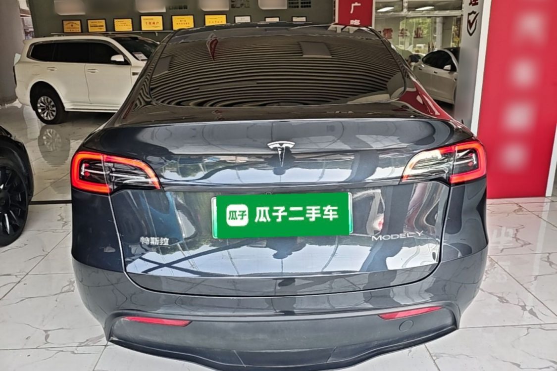 Tesla Model Y 2024 #6 Tesla Model Y 2024 car image #6