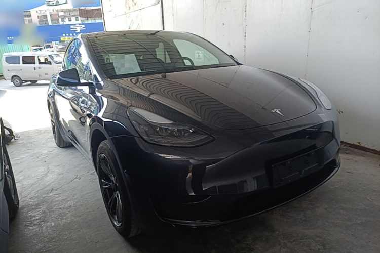 Tesla Model Y 2024 #4 Tesla Model Y 2024 car image #4