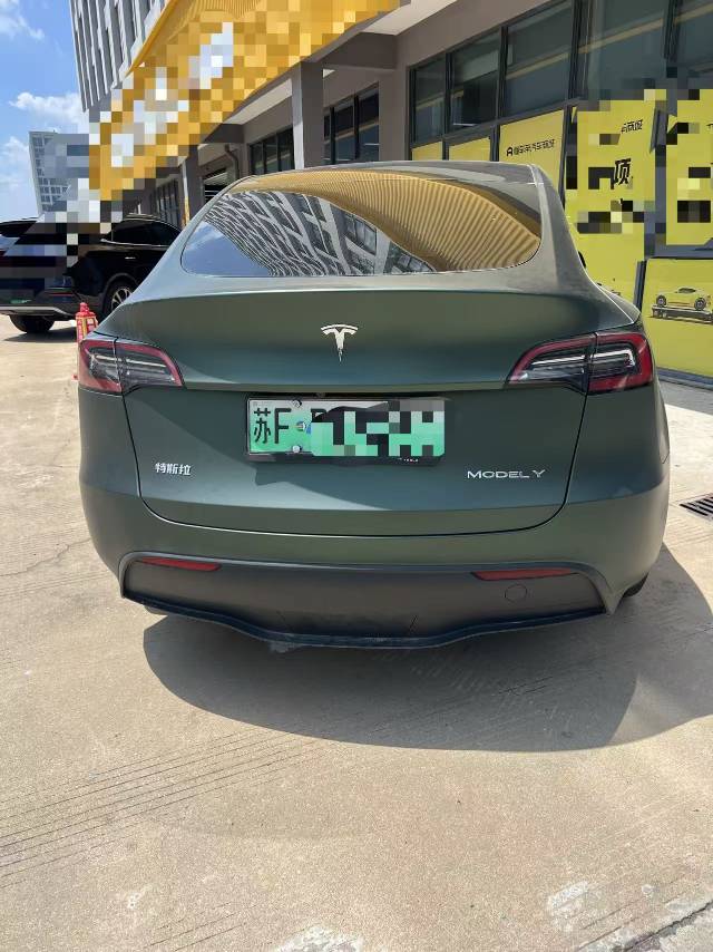 Tesla Model Y 2024 #3 Tesla Model Y 2024 car image #3