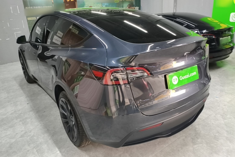 Tesla Model Y 2024 #7 Tesla Model Y 2024 car image #7