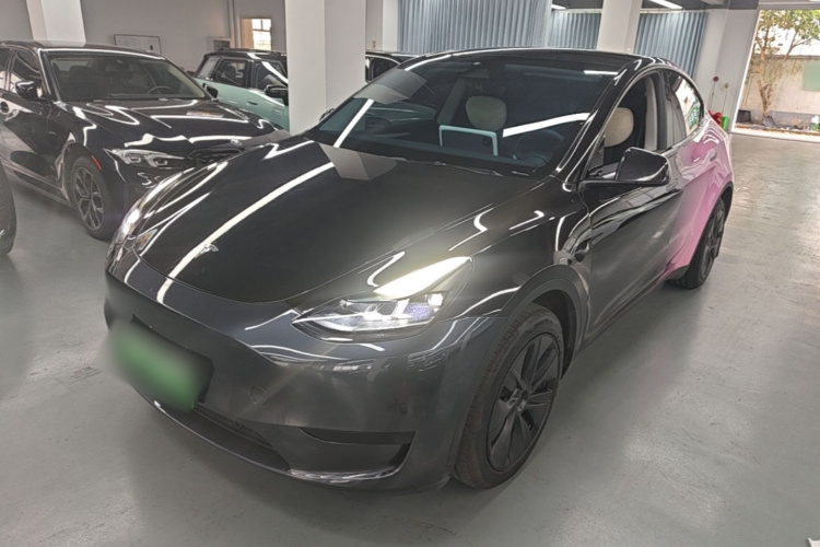 Tesla Model Y 2024 #2 Tesla Model Y 2024 car image #2