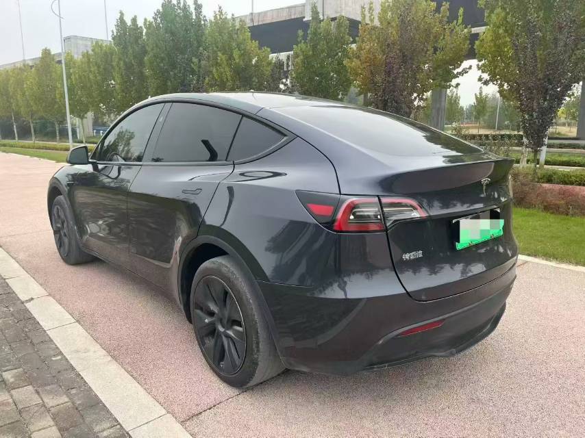 Tesla Model Y 2024 #7 Tesla Model Y 2024 car image #7