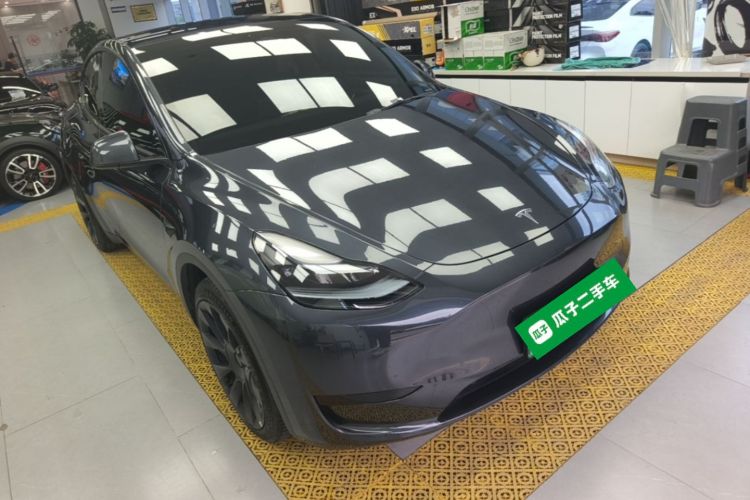 Tesla Model Y 2024 #4 Tesla Model Y 2024 car image #4