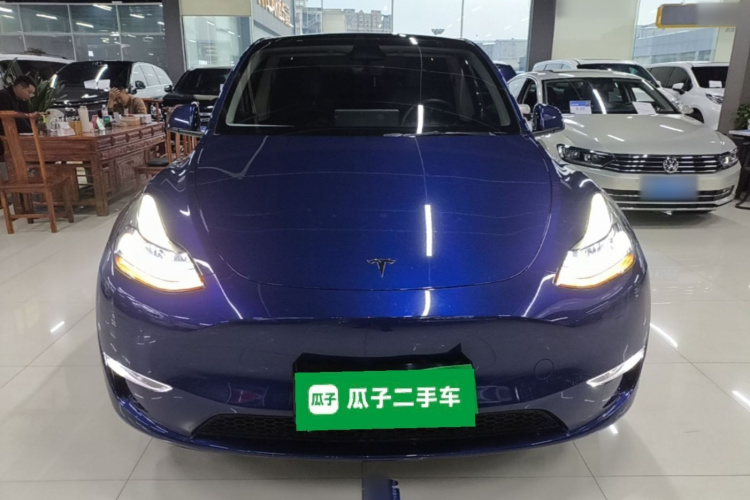 Tesla Model Y 2024 #3 Tesla Model Y 2024 car image #3