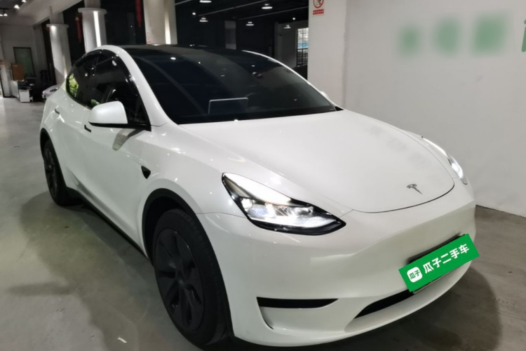 Tesla Model Y 2024 #4 Tesla Model Y 2024 car image #4