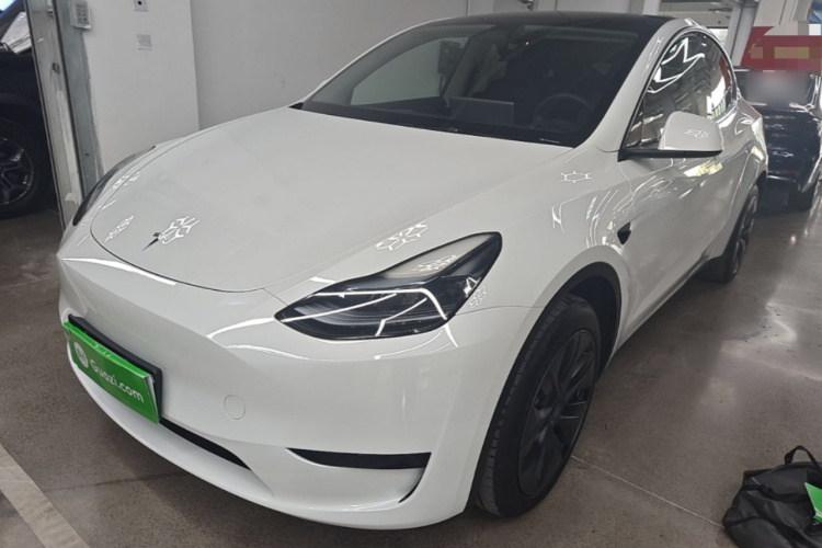 Tesla Model Y 2024 #2 Tesla Model Y 2024 car image #2