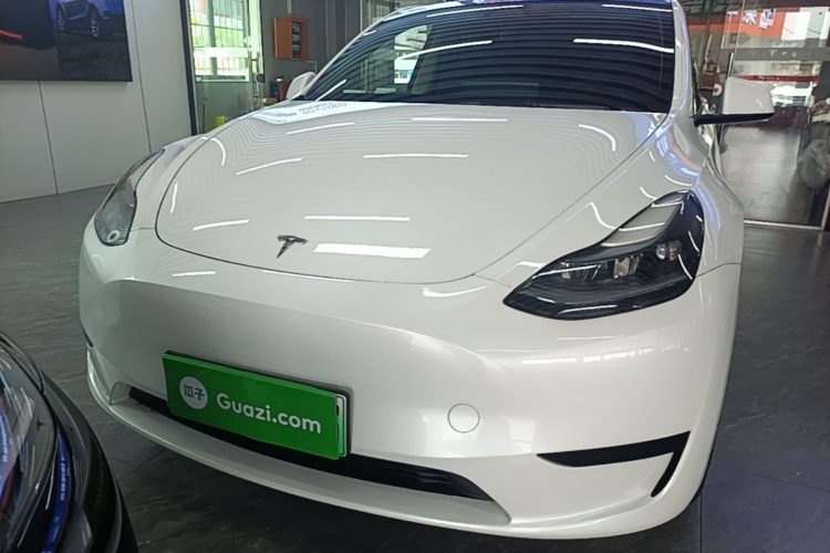 Tesla Model Y 2024 #3 Tesla Model Y 2024 car image #3