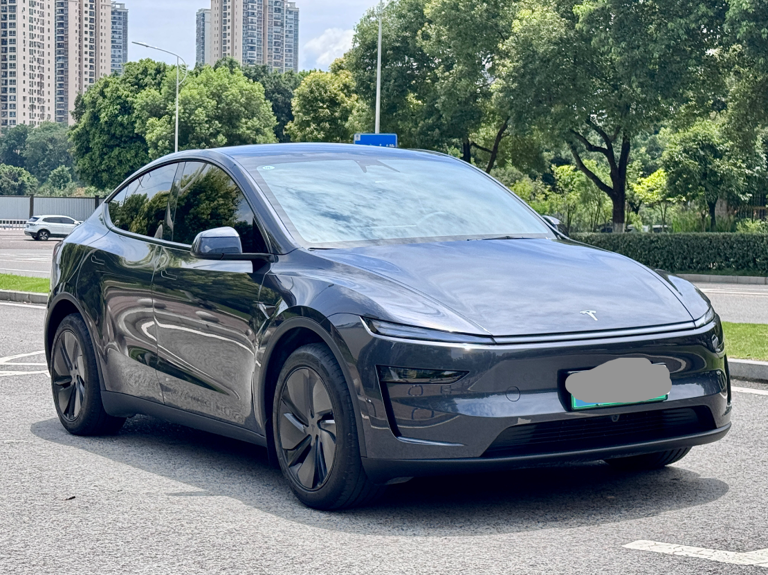 Tesla Model Y 2025 #5 Tesla Model Y 2025 car image #5