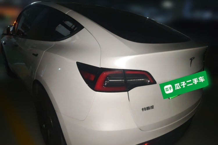 Tesla Model Y 2024 #5 Tesla Model Y 2024 car image #5