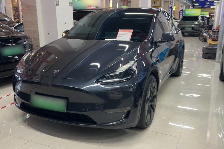 Tesla Model Y 2024 #7 Tesla Model Y 2024 car image #7