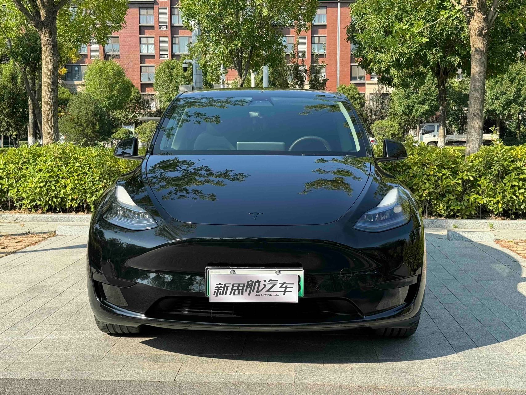 Tesla Model Y 2023 #2 Tesla Model Y 2023 car image #2