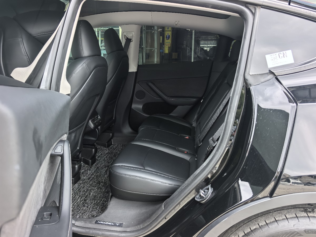 Tesla Model Y 2024 #5 Tesla Model Y 2024 car image #5