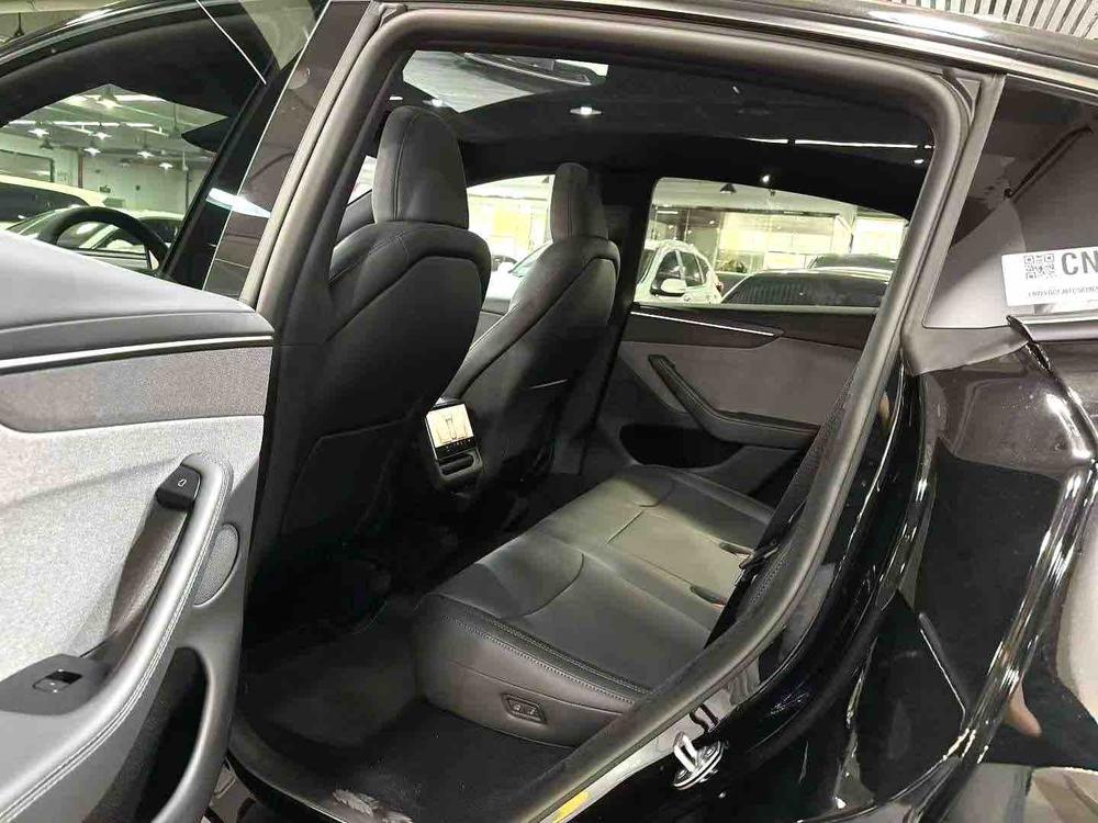 Tesla Model Y 2025 #9 Tesla Model Y 2025 car image #9