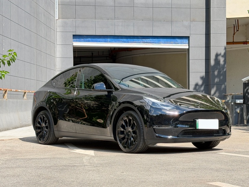 Tesla Model Y 2024 #3 Tesla Model Y 2024 car image #3