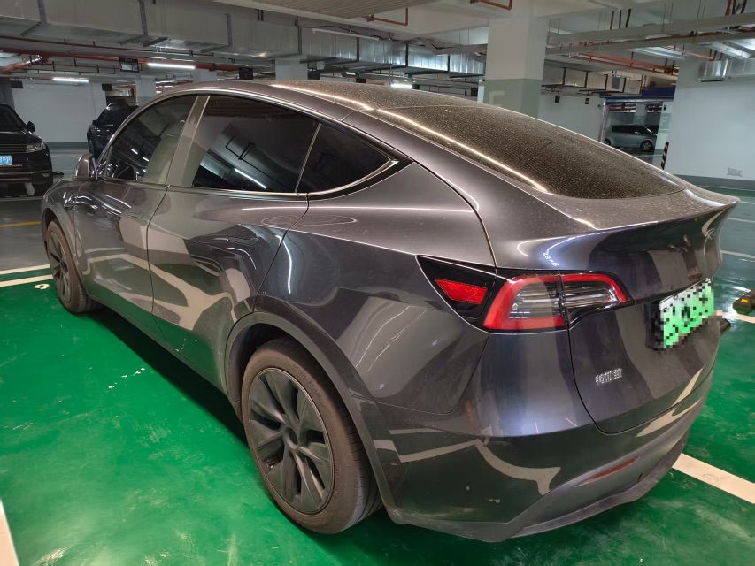 Tesla Model Y 2024 #4 Tesla Model Y 2024 car image #4