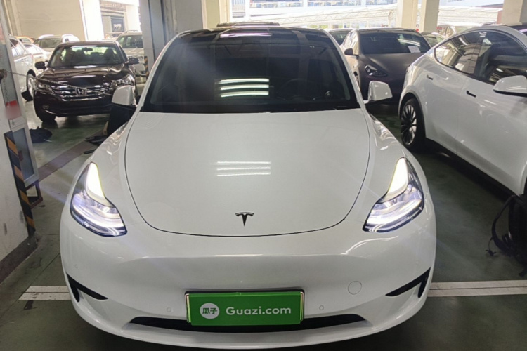 Tesla Model Y 2024 #3 Tesla Model Y 2024 car image #3