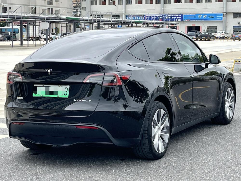 Tesla Model Y 2023 #6 Tesla Model Y 2023 car image #6