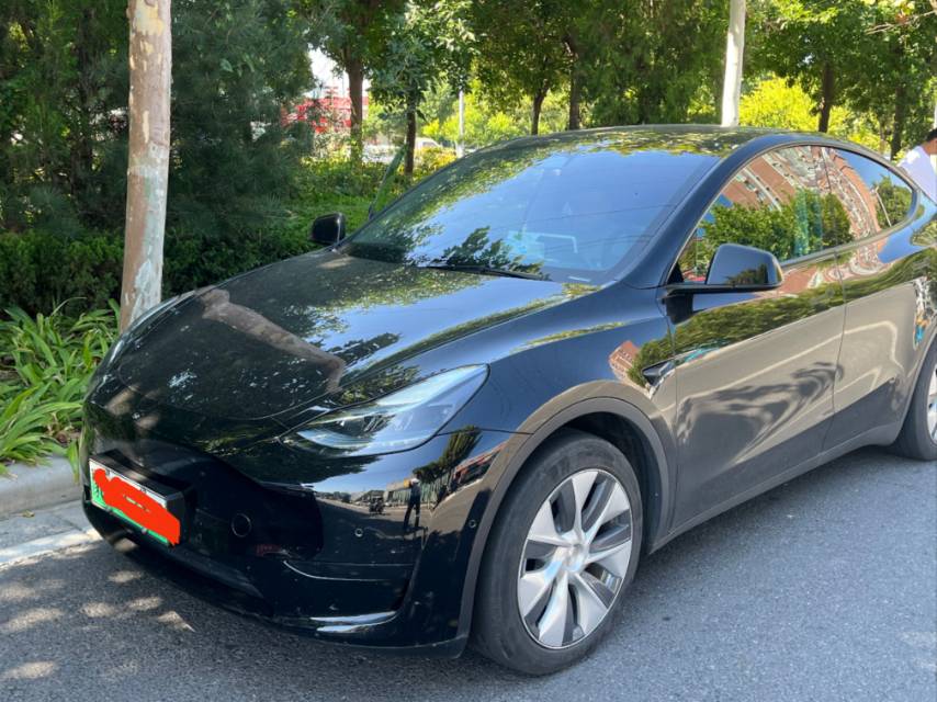 Tesla Model Y 2023 #2 Tesla Model Y 2023 car image #2