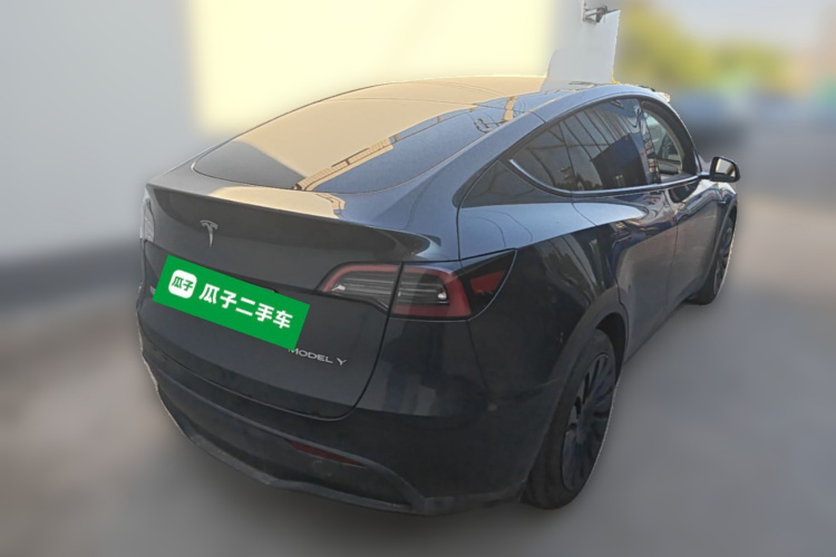 Tesla Model Y 2024 #7 Tesla Model Y 2024 car image #7