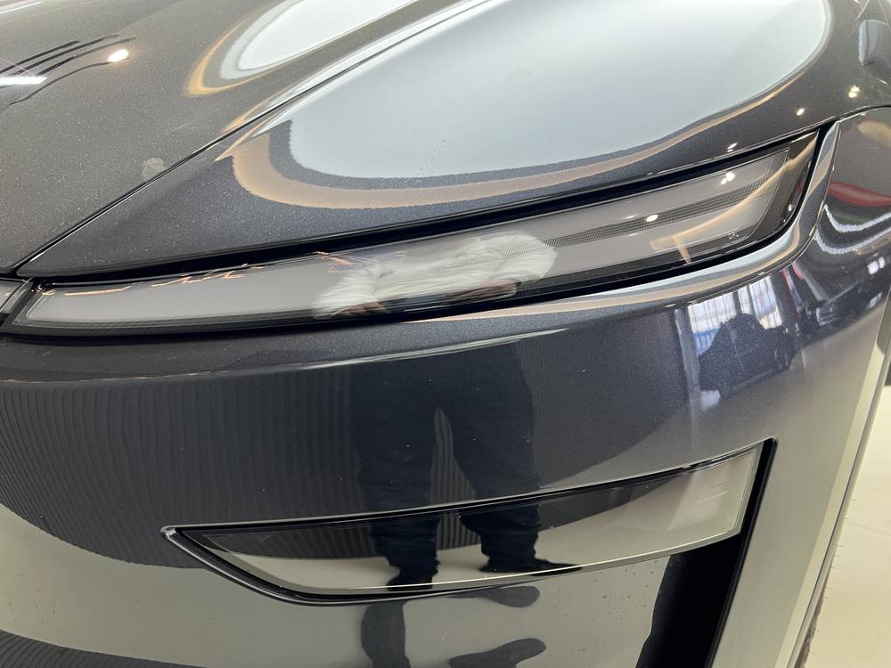 Tesla Model Y 2025 #5 Tesla Model Y 2025 car image #5