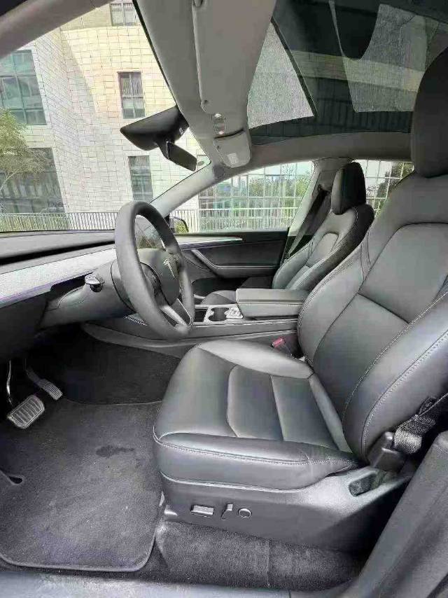 Tesla Model Y 2024 #4 Tesla Model Y 2024 car image #4