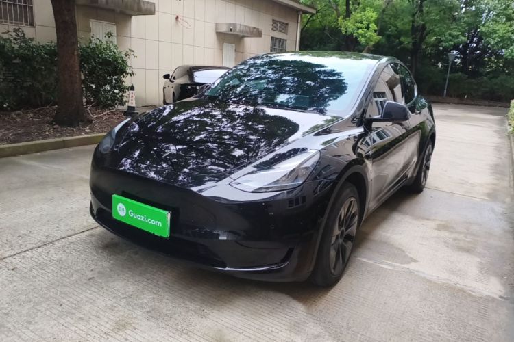 Tesla Model Y 2023 #2 Tesla Model Y 2023 car image #2