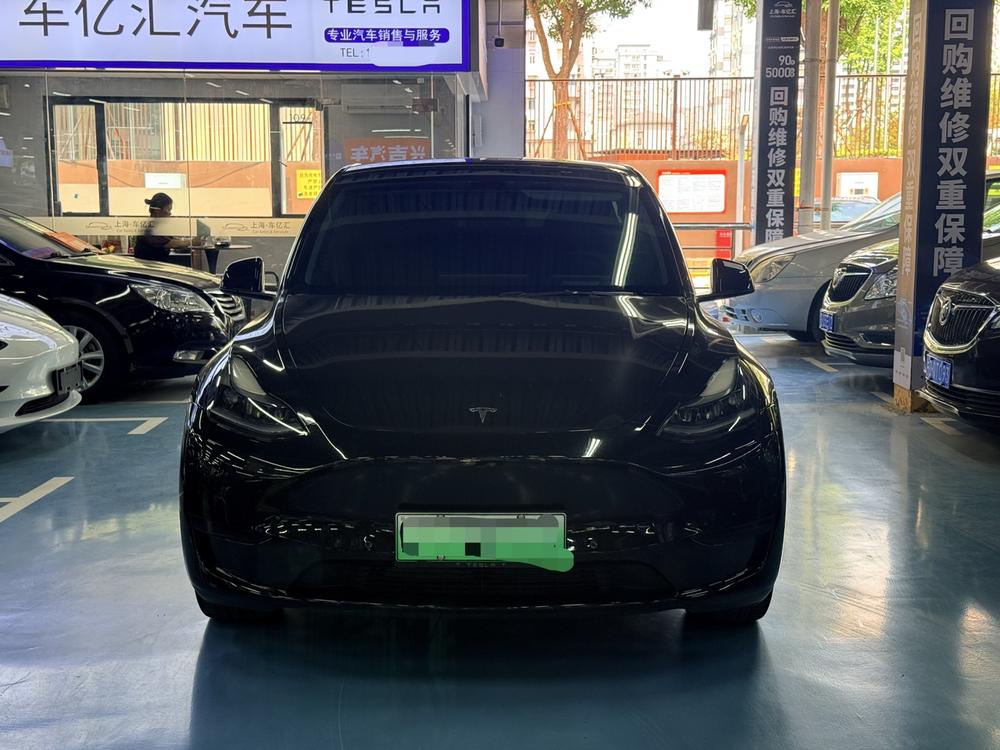 Tesla Model Y 2023 #2 Tesla Model Y 2023 car image #2