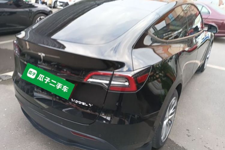 Tesla Model Y 2023 #5 Tesla Model Y 2023 car image #5