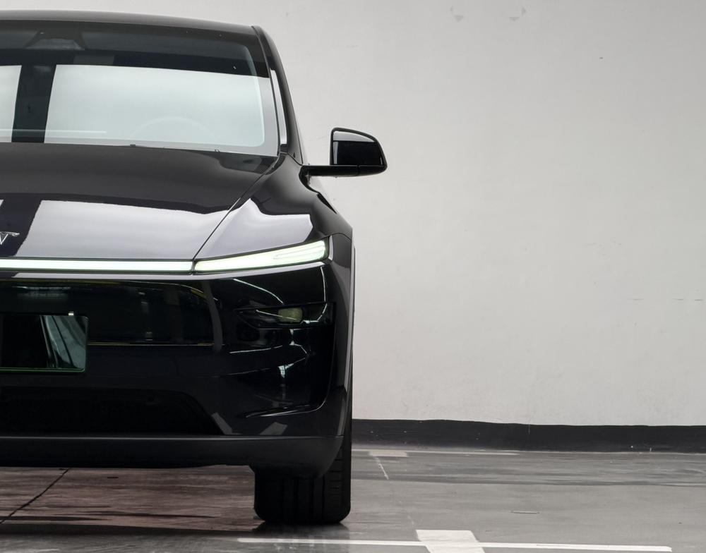 Tesla Model Y 2025 #7 Tesla Model Y 2025 car image #7