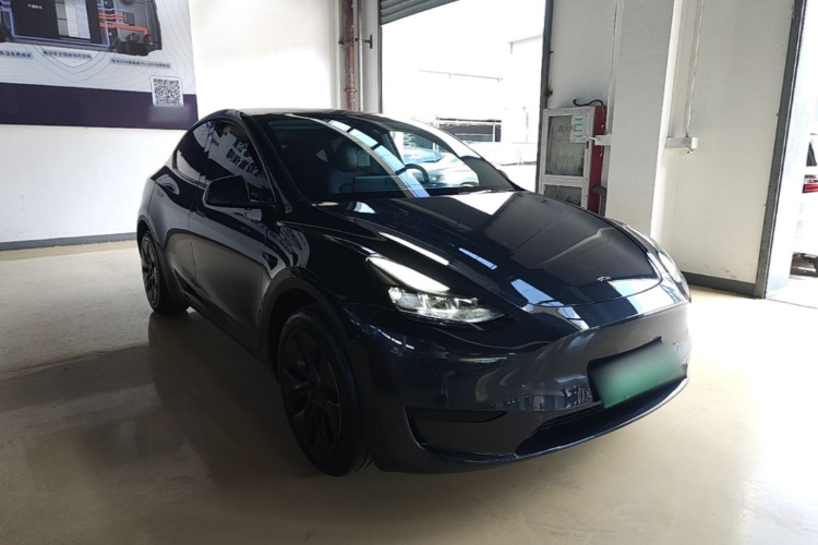 Tesla Model Y 2024 #4 Tesla Model Y 2024 car image #4