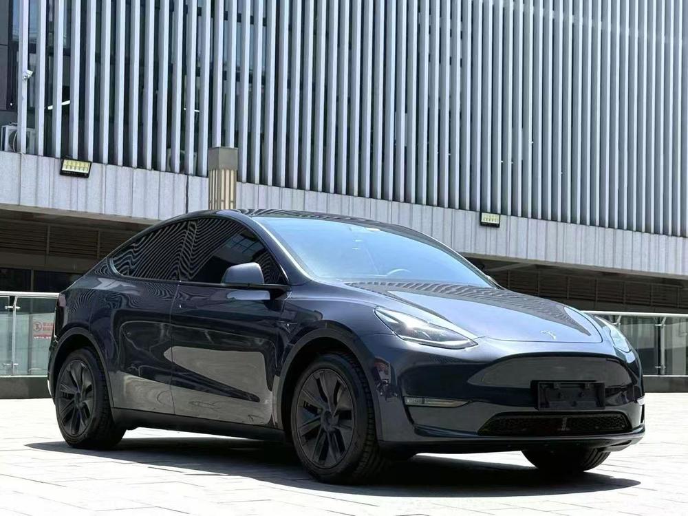Tesla Model Y 2024 #3 Tesla Model Y 2024 car image #3