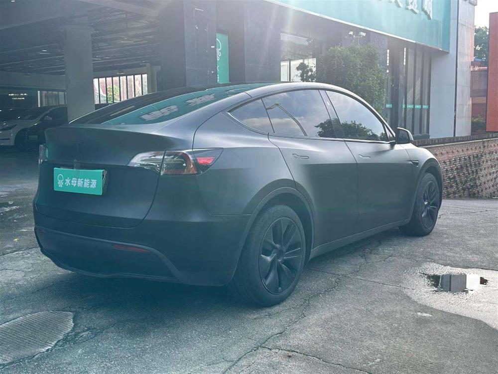 Tesla Model Y 2024 #7 Tesla Model Y 2024 car image #7